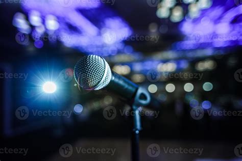 Microphone on a Stage 4295967 Stock Photo at Vecteezy