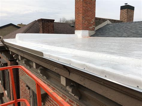 Downtown Madison In Flat Roof And Gutter Installation