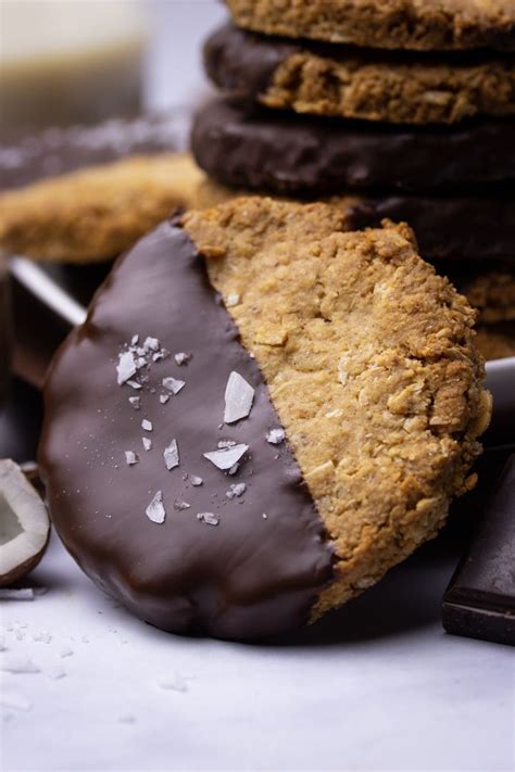 Chocolate Covered Cookies With White Frosting And Sea Salt