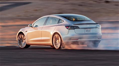 Tesla Model 3 Performance with Track Mode beats a Ferrari's record in ...