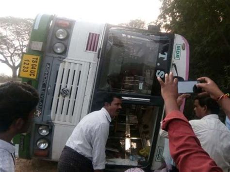 Narrow Escape For Passengers After Rtc Bus Lorry Collide In Khammam