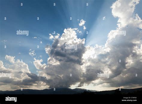 Light mood with sun behind the clouds Stock Photo - Alamy