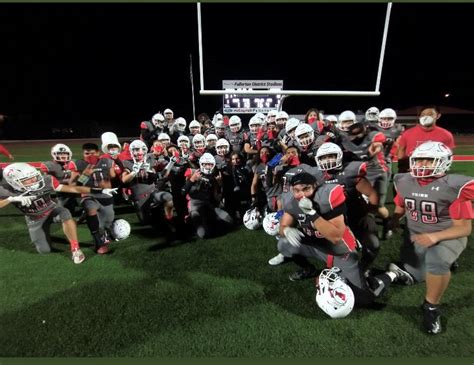 Fullerton Football Players Celebrate Victorious Return To The Field