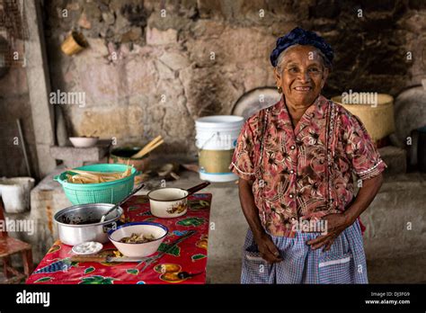 An Elderly Zapotec Indigenous Woman Poses In Her Kitchen In Teotitlan