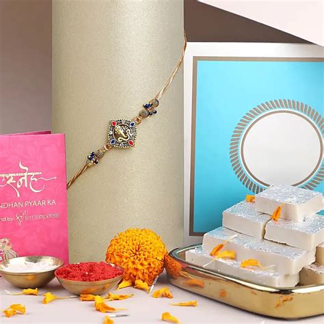 Online Celestial Ganesha Serenade Rakhi With Kaju Katli Combo Gift