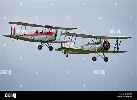 Tiger Moth And Avro Tutor Biplane Trainers At An Airshow At