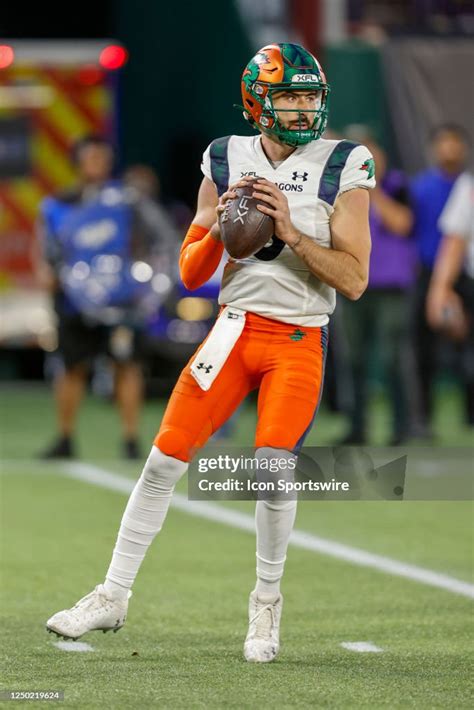 Seattle Sea Dragons quarterback Ben DiNucci looks downfield for an... News Photo - Getty Images