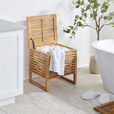 The Rubberwood Towel Hamper Hammacher Schlemmer