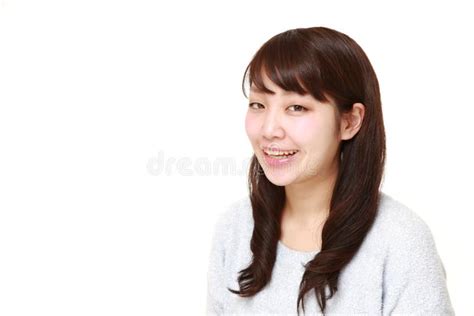 Young Japanese Woman Smiles Stock Image Image Of Casual Studio