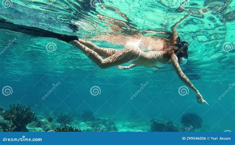 Woman Snorkelling Or Coral Reef In Ocean Surface Nature Or Swimming