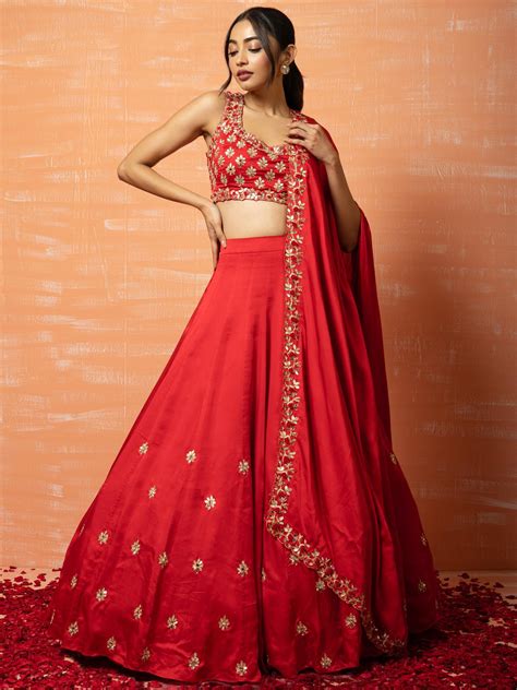 A Three Piece Red Bridal Silk Lehenga Set From The Quench A Thirst