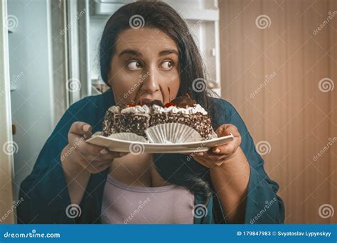 Woman Eating Chocolate Cake