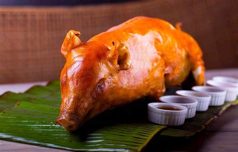 Lechon In Mesa Filipino Moderne | TasteAtlas | Recommended authentic ...