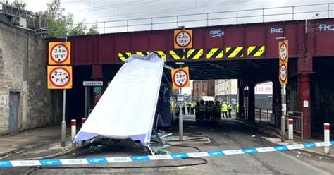 Ten Injured After Double Decker Bus Crashes Into Low Bridge And Entire