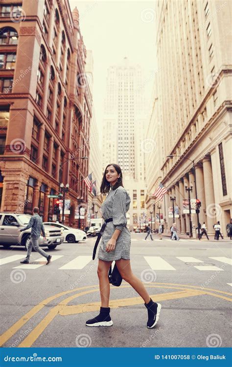 Beautiful Brunette Girl Exploring The City During Autumn Editorial