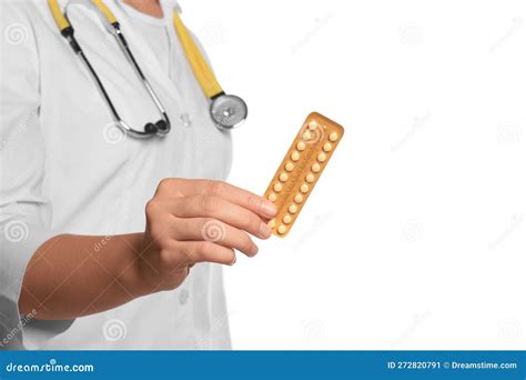 Doctor Holding Blister Of Oral Contraception Pills On White Background