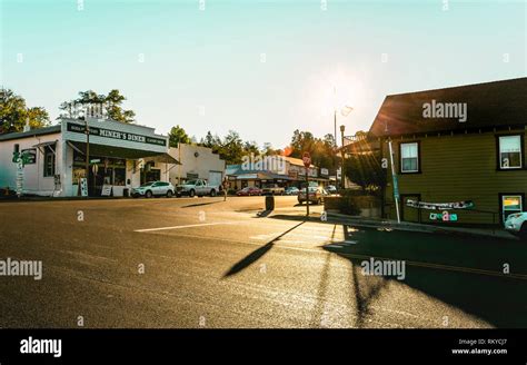 Pedestrian Crosses The Street In The Historic Small Town Of Julian In