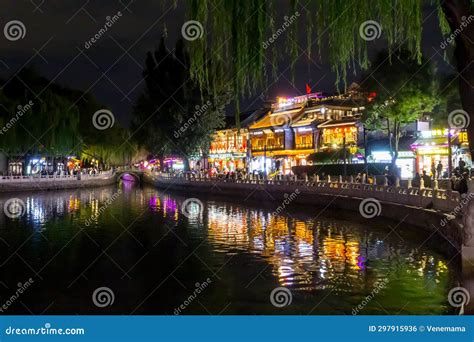 Night View Of The Restaurants And Bridge At The Qianhai Lake In Beijing