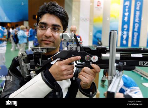 India's Abhinav Bindra poses for a photo after the men's 10m air rifle ...