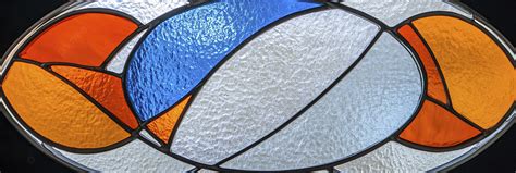 Stained Glass Window Oval Shape Blue And Orange Color In White ...