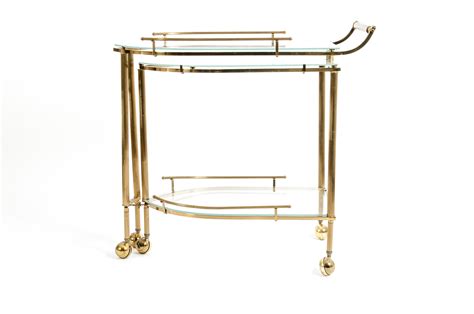 Mid 20th Century Brass Glass Three Tier Swivel Wheeled Bar Cart La