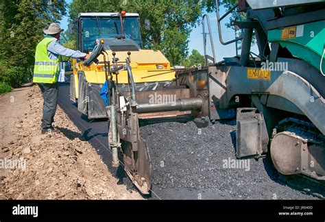 Asphalt Paver Machine During Road Construction Road Construction Crew