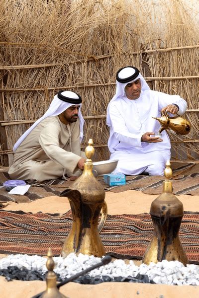 4 Arabic Men Gather Together Drink Coffee Seating Traditional Bedouin