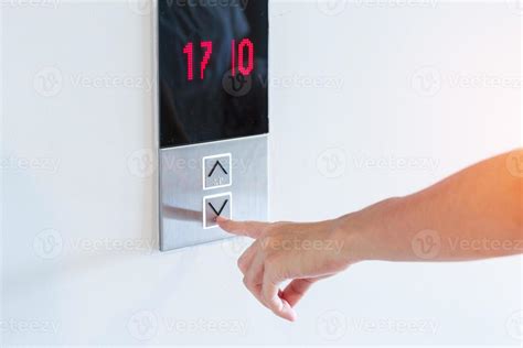 Hand Finger Press The Elevator Button Woman Waiting For Elevator In Office Or Apartment