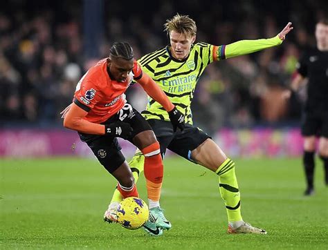 Photo Mug Of Arsenals Martin Odegaard Faces Off Against Luton