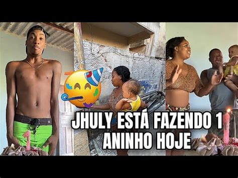 Flavinho Tita e o pai cantando parabéns para Jhuly que está fazendo 1