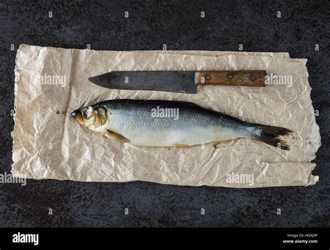 Salted Herring On A Piece Of Crumpled Wrapping Paper Stock Photo Alamy