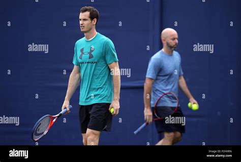 Andy Murray practices with coach Jamie Delgado (right) during a ...