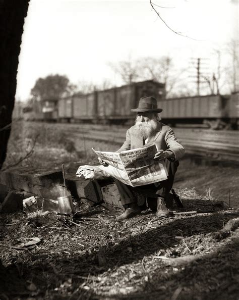 1930s Hobo Sitting By Railroad Track Photograph By Vintage Images