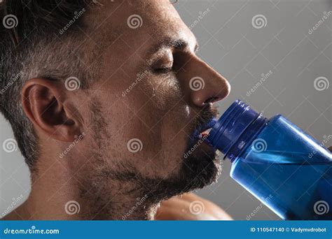 Mature Shirtless Man With Victory Sign Stock Photography