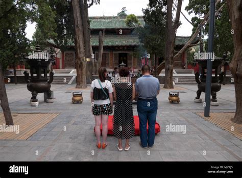 Fuxi Temple (Fuxi Miao) in Tianshui, Gansu province, China, Asia. Chinese people praying at old ...