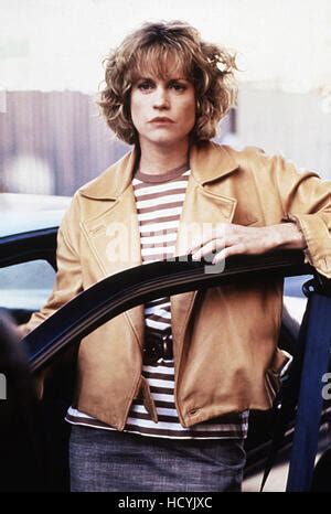 A STRANGER AMONG US, Melanie Griffith (with gun), 1992, (c) Buena Vista ...