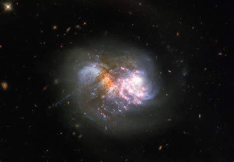 Clash of the Titans: Hubble Spots a Cataclysmic Cosmic Collision