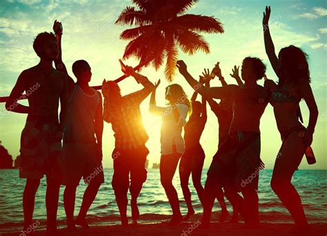 People Celebrate At A Party On A Tropical Island Stock Photo By