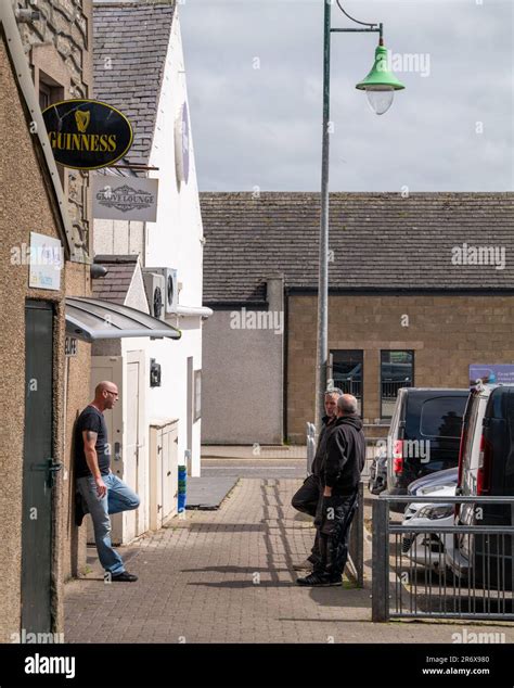 june  thursoscotland    adult males chatting