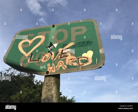 Graffiti on a stop sign Stock Photo - Alamy