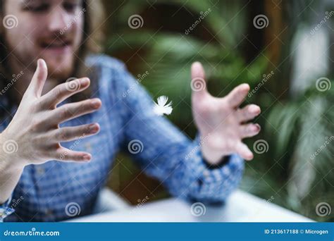 Telekinetic Power Practicing Telekinesis With Feather Stock Photo