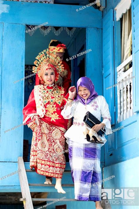 A bride at traditional Sulawesi wedding, Makassar, Sulawesi, Indonesia ...