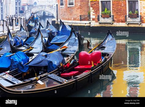 Venetian Streets And Canals Scenery With Traditional Gondola Boats