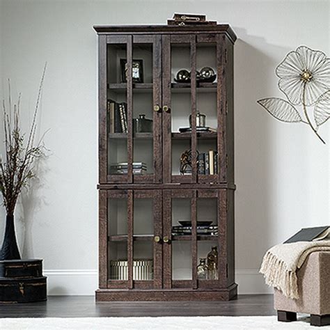 Contemporary Tempered Glass Tall Display Cabinet In Coffee Oak Mathis Brothers Furniture