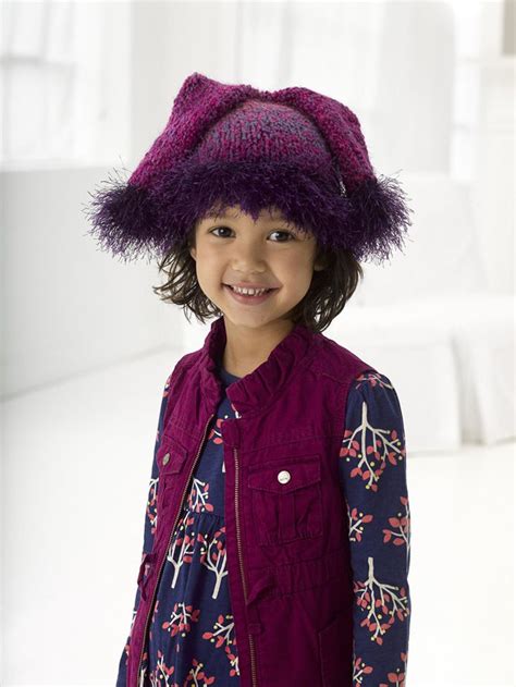 Double Tail Hat In Lion Brand Fun Fur L20607 Knitting Patterns