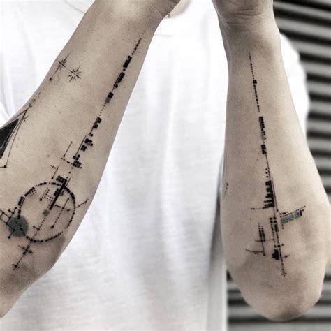 Matching Abstract Tattoos On Both Forearms