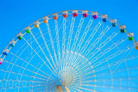 Ferris Wheel with Colorful Cars Stock Photo - Image of closeup, sunny ...