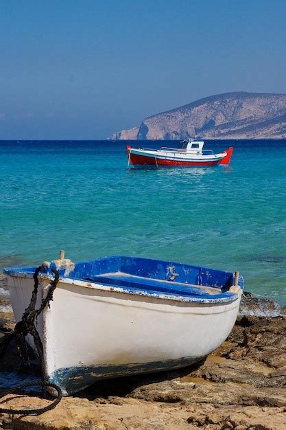 Premium Photo Greece Boat Moored On Sea Shore Against Sky