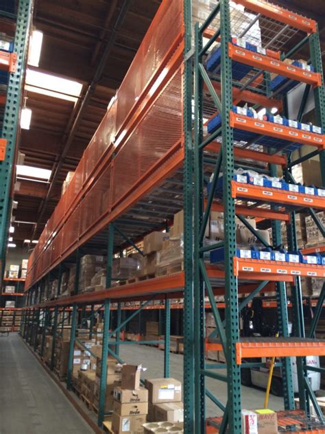 How To Anchor Pallet Racks Safely Quality Material Handling Inc Blog