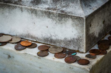 Coins On A Headstone Five Little Known Facts About Grave Decoratio